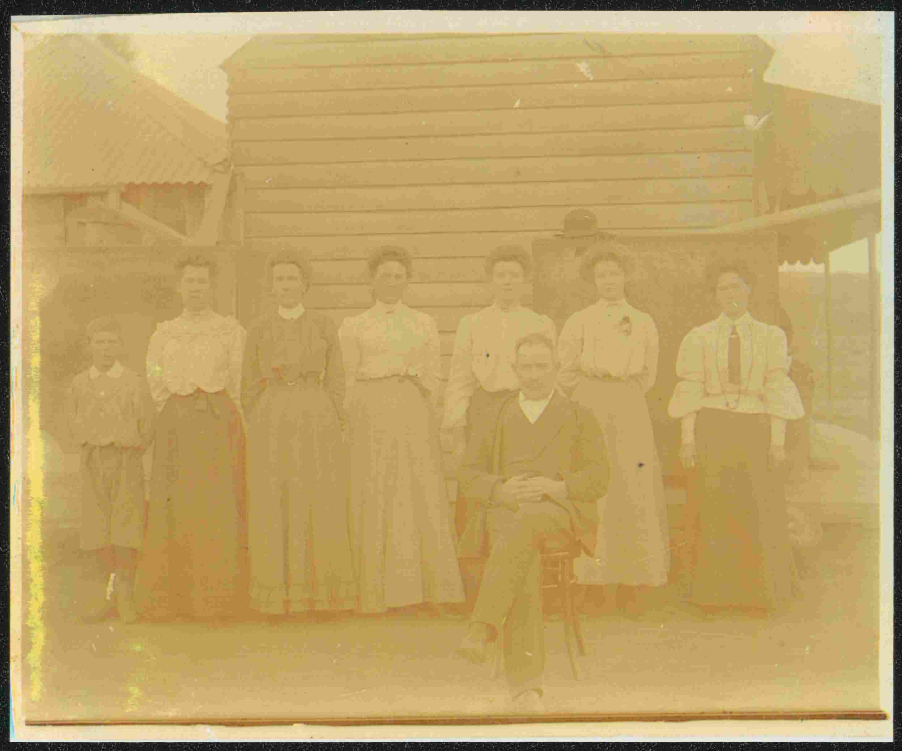 Fromes Creek Public School - beside school's residence, from left Albert Cox, Una Croan, Mrs Croan, Grace Cox, Mabel Croan, B. Batchelor, Christina Cox, John Croan (seated) NRS-15051-1-14-[744]-1